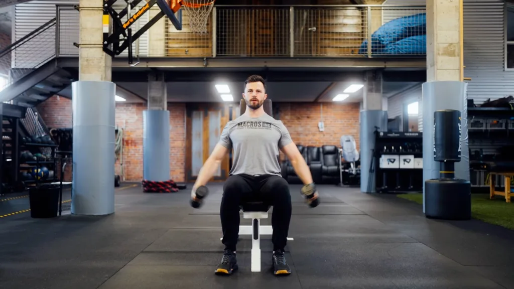seated-dumbbell-lateral-raise-poster